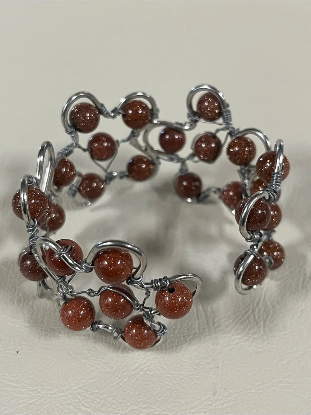 Sparkling Goldstone Bead Wire Cuff Bracelet